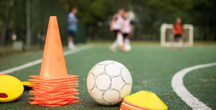 football-trainer-teaching-his-pupils